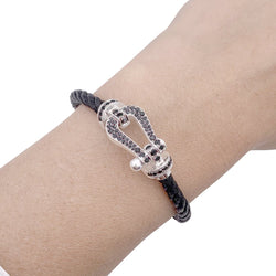 Bracelet FRED "Force 10" en or blanc, acier et diamants noirs - Castafiore