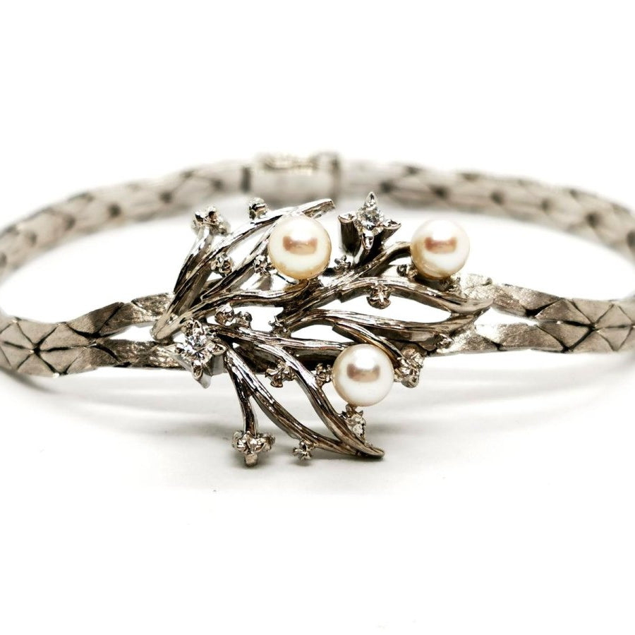 Bracelet géométrique motif feuillage en or blanc, perles et diamants - Castafiore