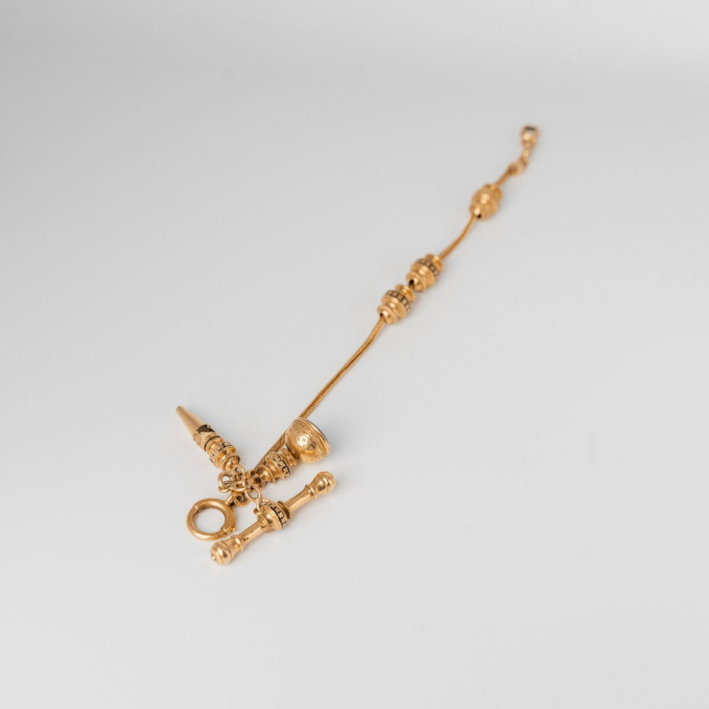 Bracelet giletière en or jaune et rose avec sa clef et son crochet - Castafiore