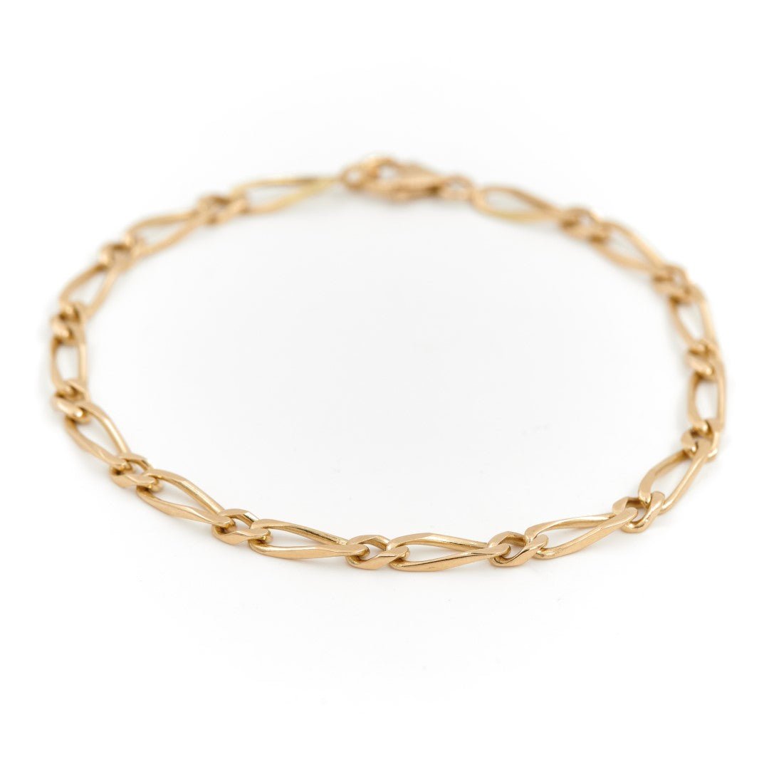 Bracelet Gourmette maille figaro en or jaune - Castafiore