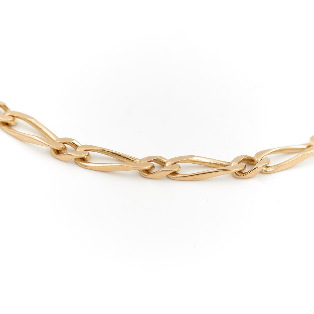 Bracelet Gourmette maille figaro en or jaune - Castafiore