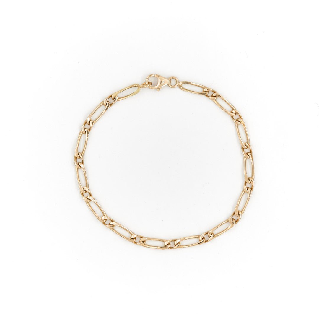 Bracelet Gourmette maille figaro en or jaune - Castafiore