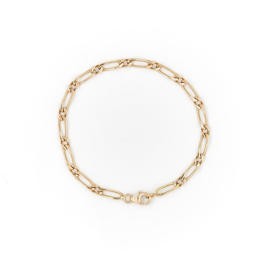 Bracelet Gourmette maille figaro en or jaune - Castafiore