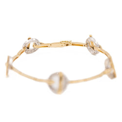 Bracelet GUY LAROCHE en or jaune et diamants - Castafiore