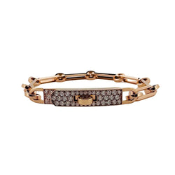 Bracelet HERMES "Kelly" en or rose et diamants - Castafiore