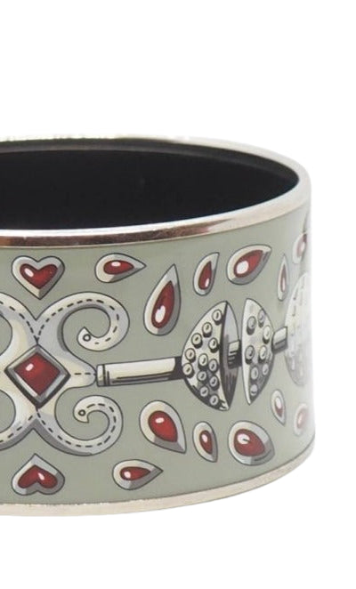 Bracelet Hermès manchette en métal argenté à décor - Castafiore