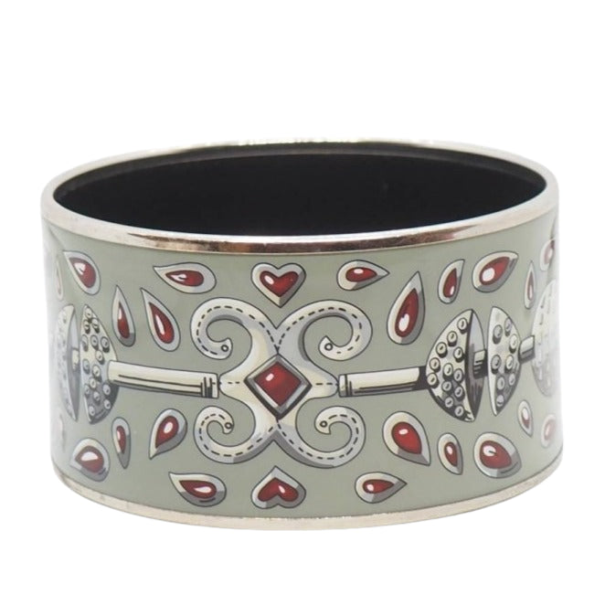 Bracelet Hermès manchette en métal argenté à décor - Castafiore