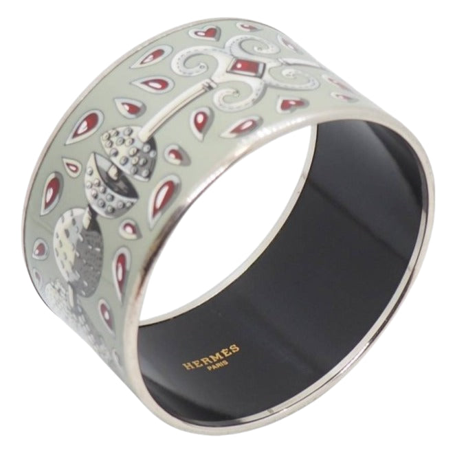 Bracelet Hermès manchette en métal argenté à décor - Castafiore