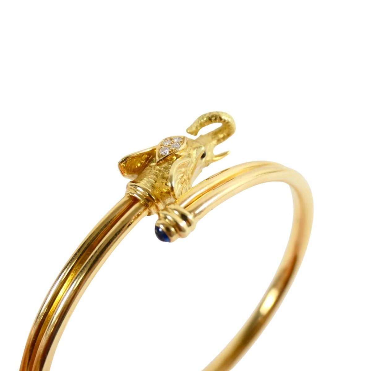 Bracelet JEAN ET PIERRE BELLIN Éléphant double jonc ouvert en or jaune, saphir, onyx et diamants - Castafiore