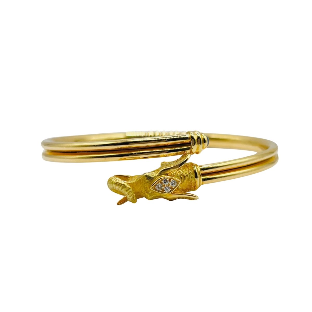 Bracelet JEAN ET PIERRE BELLIN Éléphant double jonc ouvert en or jaune, saphir, onyx et diamants - Castafiore