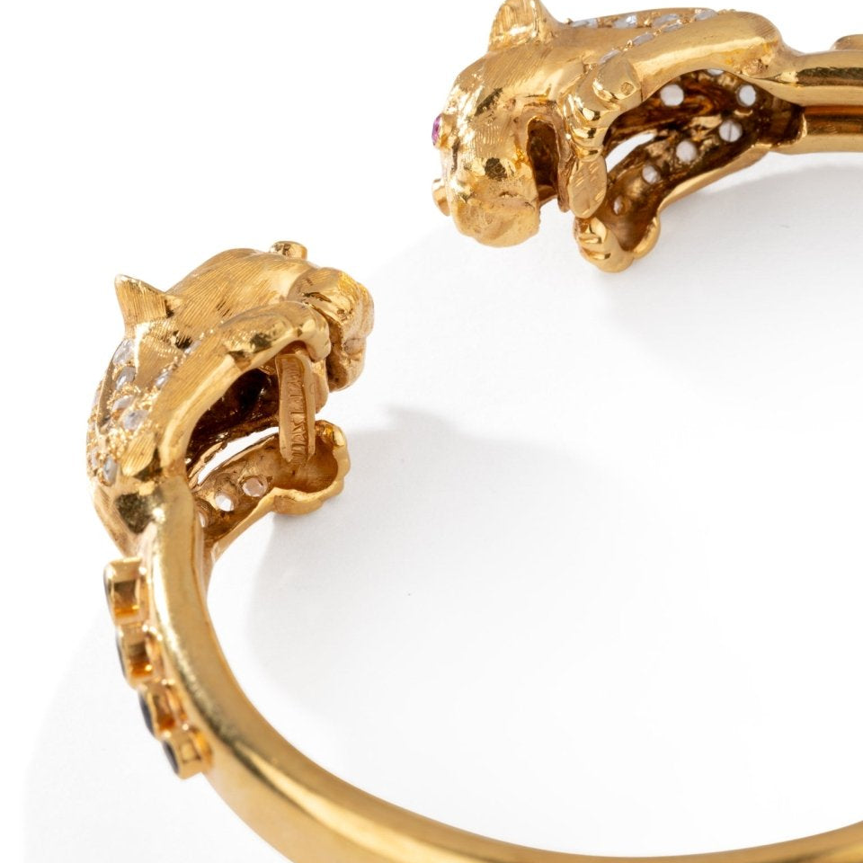Bracelet Jonc LALAOUNIS en or jaune à deux têtes de lion - Castafiore