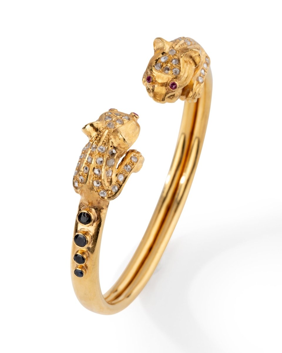 Bracelet Jonc LALAOUNIS en or jaune à deux têtes de lion - Castafiore