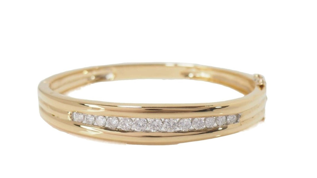 Bracelet jonc ouvrant en or jaune et diamants - Castafiore