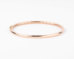 Bracelet jonc ouvrant en or rose serti de 3 lignes de diamant - Castafiore