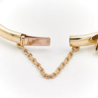 Bracelet Jonc serpent en 2 ors, rubis et diamants - Castafiore