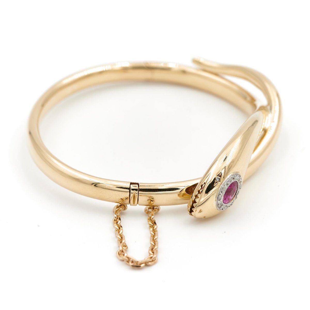 Bracelet Jonc serpent en 2 ors, rubis et diamants - Castafiore