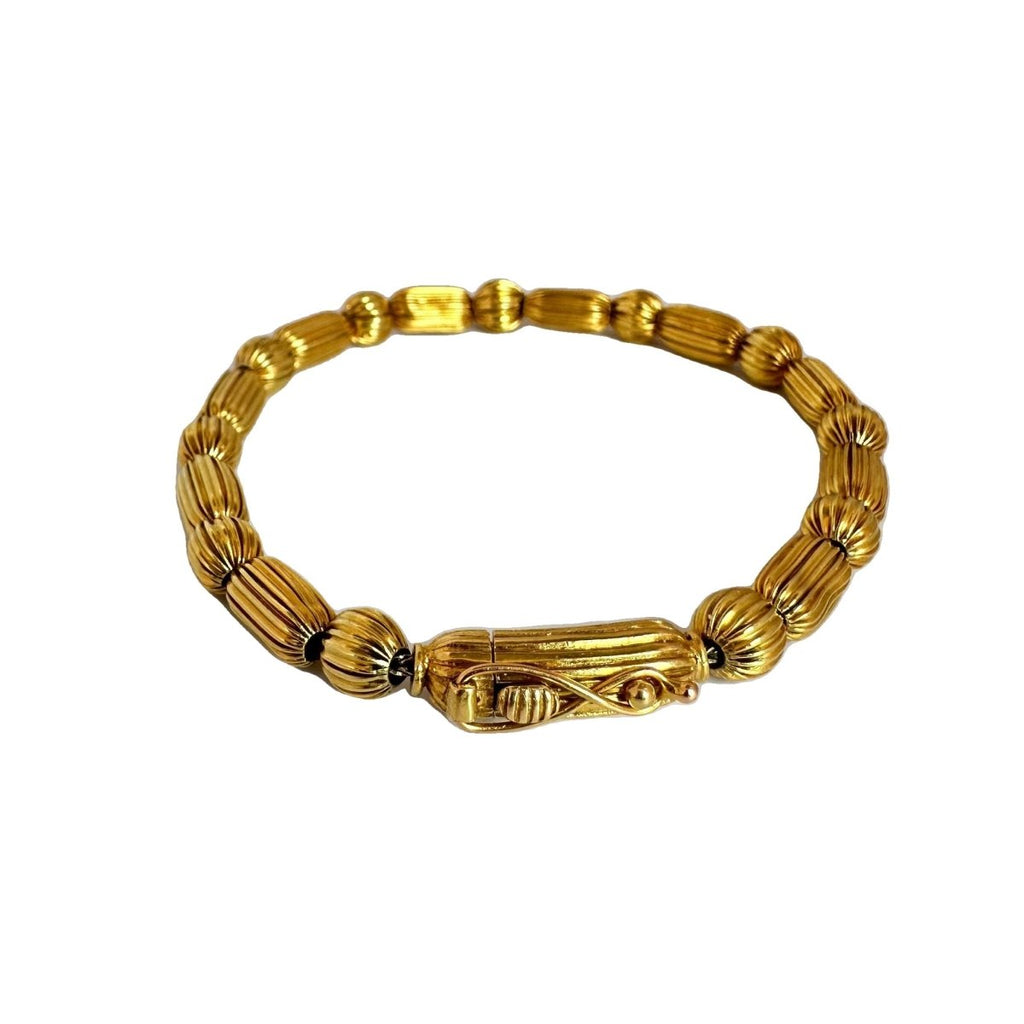 Bracelet LALAOUNIS en or jaune à motifs de godrons - Castafiore