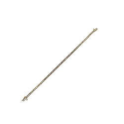 Bracelet Ligne tennis en or jaune serti de diamants taille princesse. - Castafiore