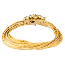 Bracelet Manchette en or jaune, saphirs et diamants - Castafiore