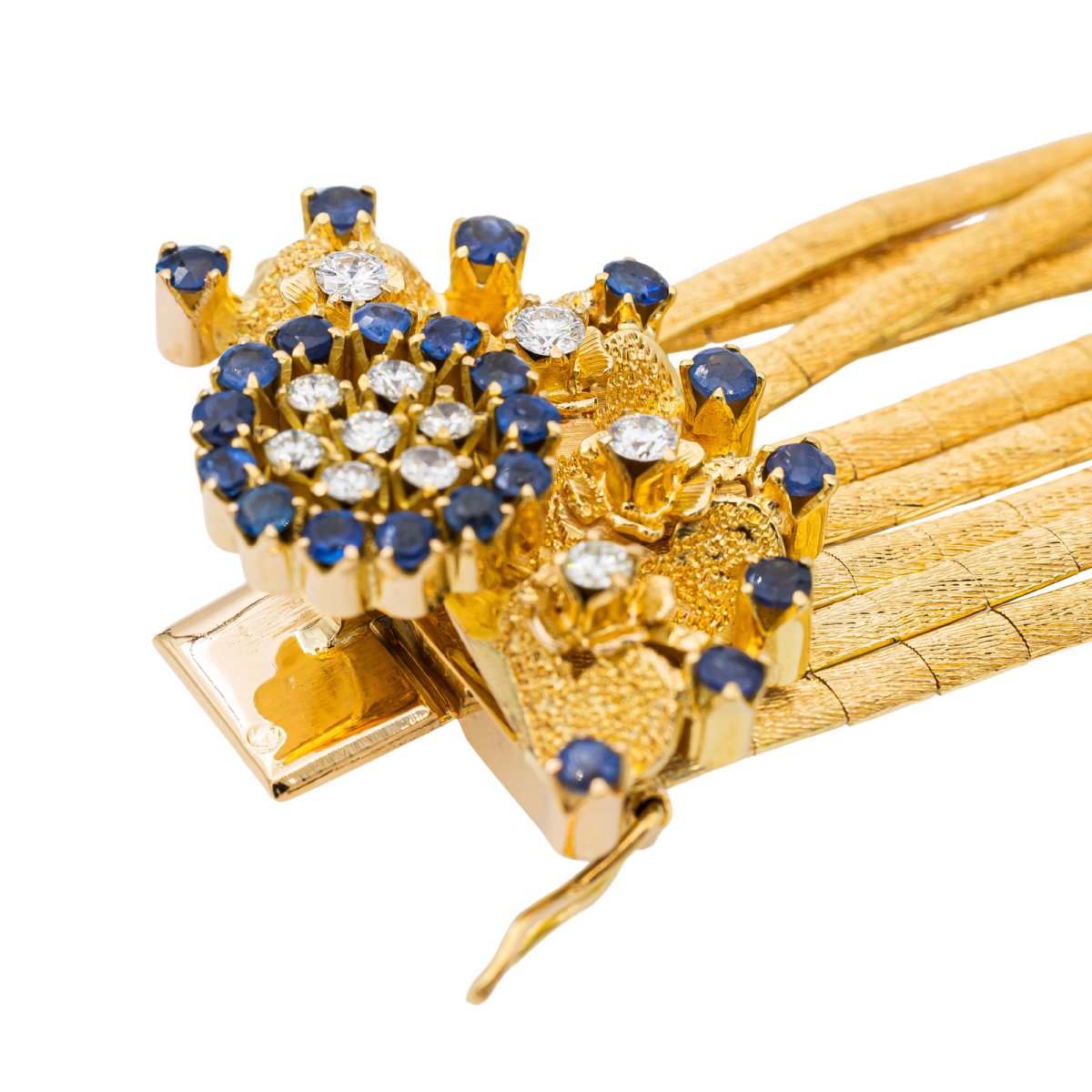 Bracelet Manchette en or jaune, saphirs et diamants - Castafiore