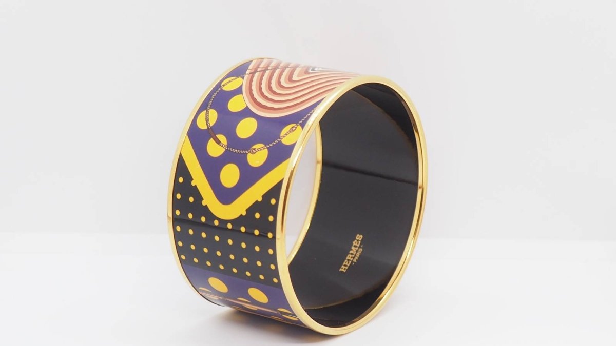Bracelet Manchette HERMÈS en métal doré émaillé - Castafiore