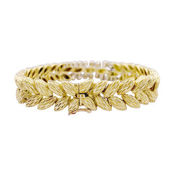 Bracelet Mauboussin vintage, or jaune et diamants. - Castafiore