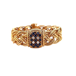 Bracelet Montre BOUCHERON en or jaune, diamants et saphirs - Castafiore