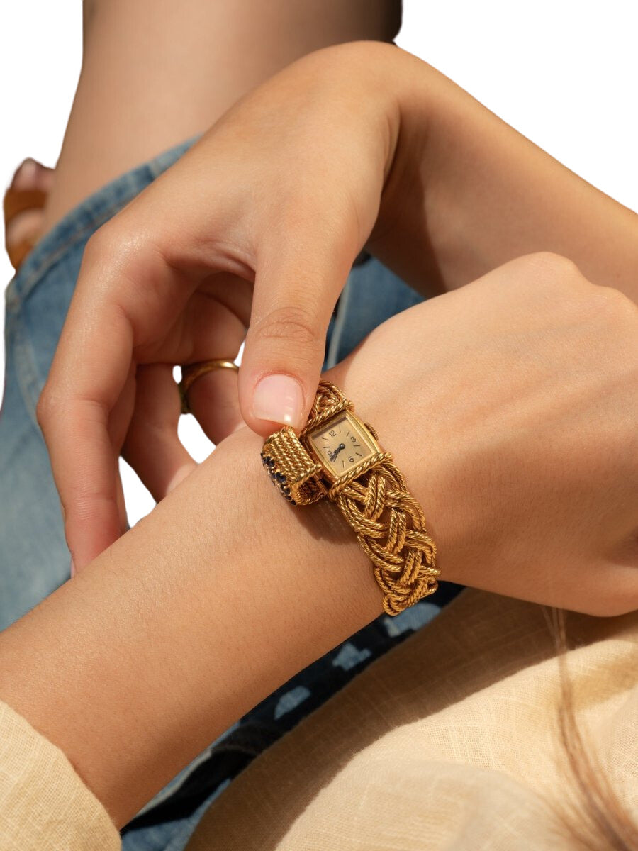 Bracelet Montre BOUCHERON en or jaune, diamants et saphirs - Castafiore