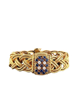 Bracelet Montre BOUCHERON en or jaune, diamants et saphirs - Castafiore