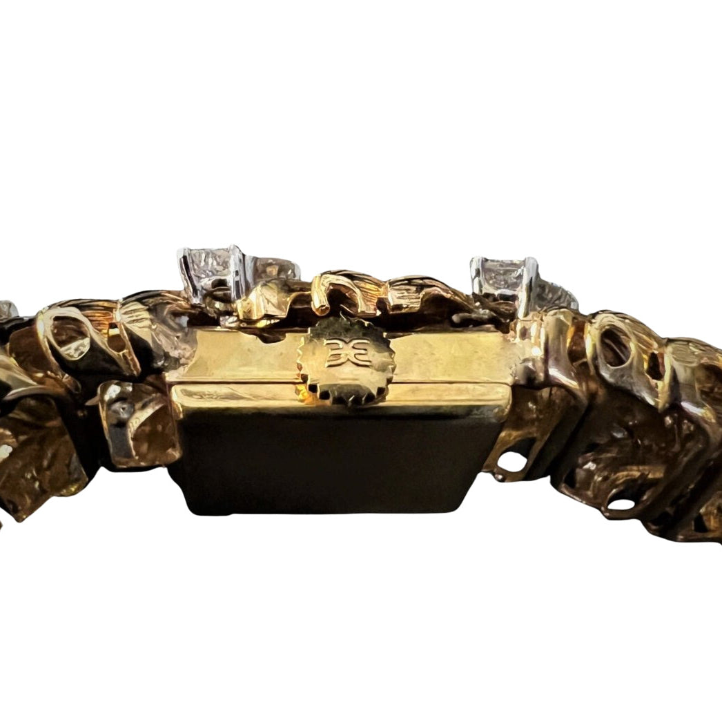 Bracelet-Montre EBEL en or jaune, platine et diamant - Castafiore