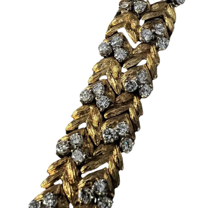 Bracelet-Montre EBEL en or jaune, platine et diamant - Castafiore