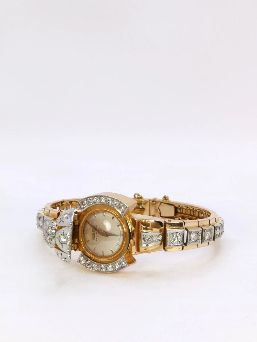 Bracelet Montre vintage en or jaune et diamants, 1950 - Castafiore