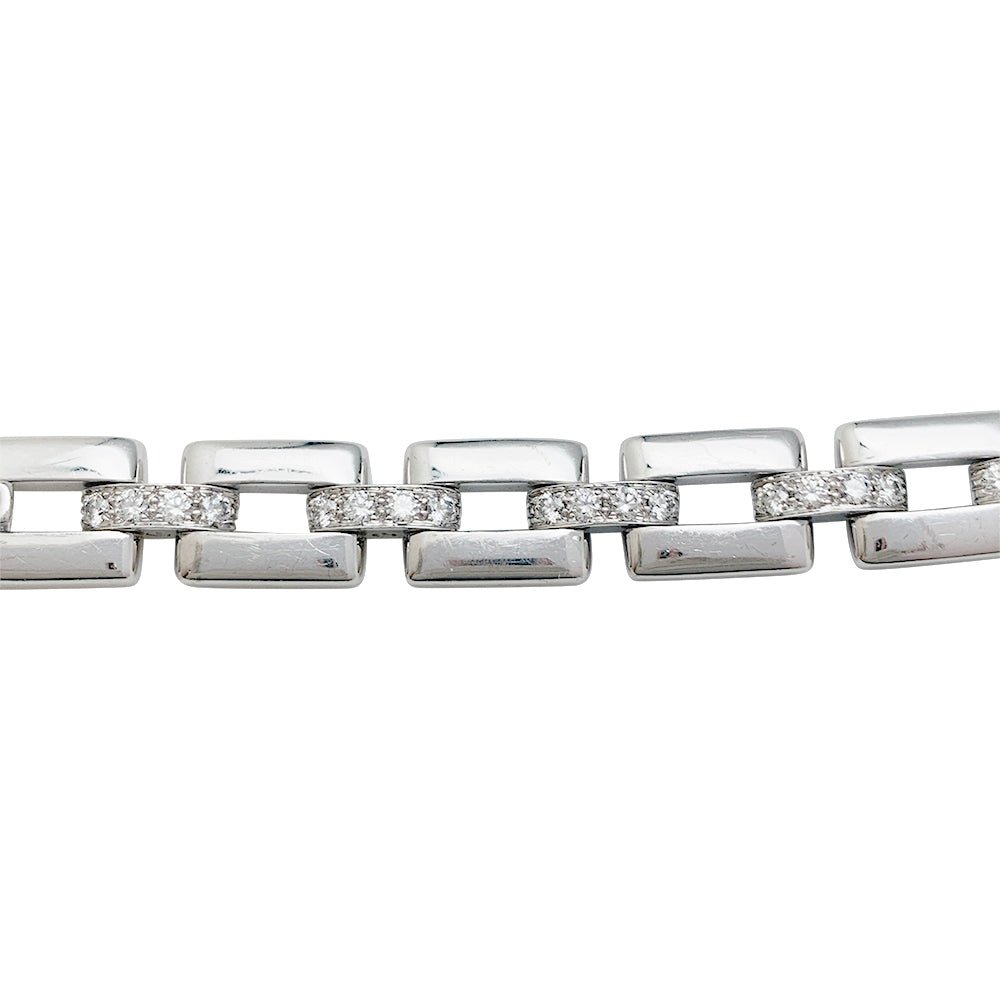 Bracelet "Panthère " CARTIER en or blanc, diamants, émeraude et onyx - Castafiore