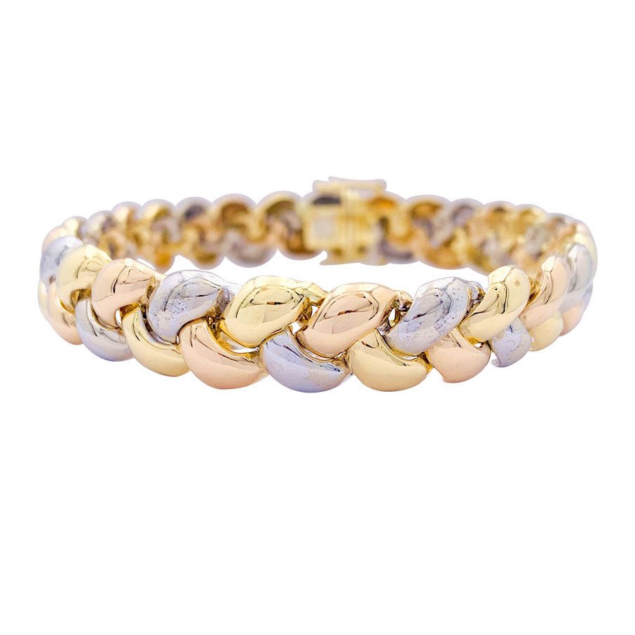 Bracelet Poiray, "Tresse", trois tons d'or. - Castafiore