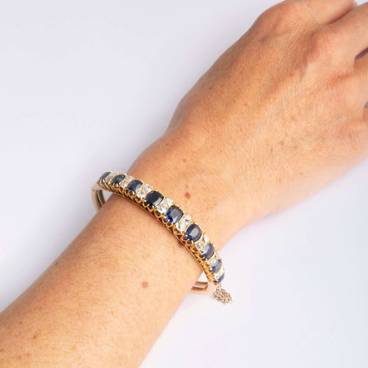 Bracelet Rigide en or jaune et en diamants et saphirs - Castafiore
