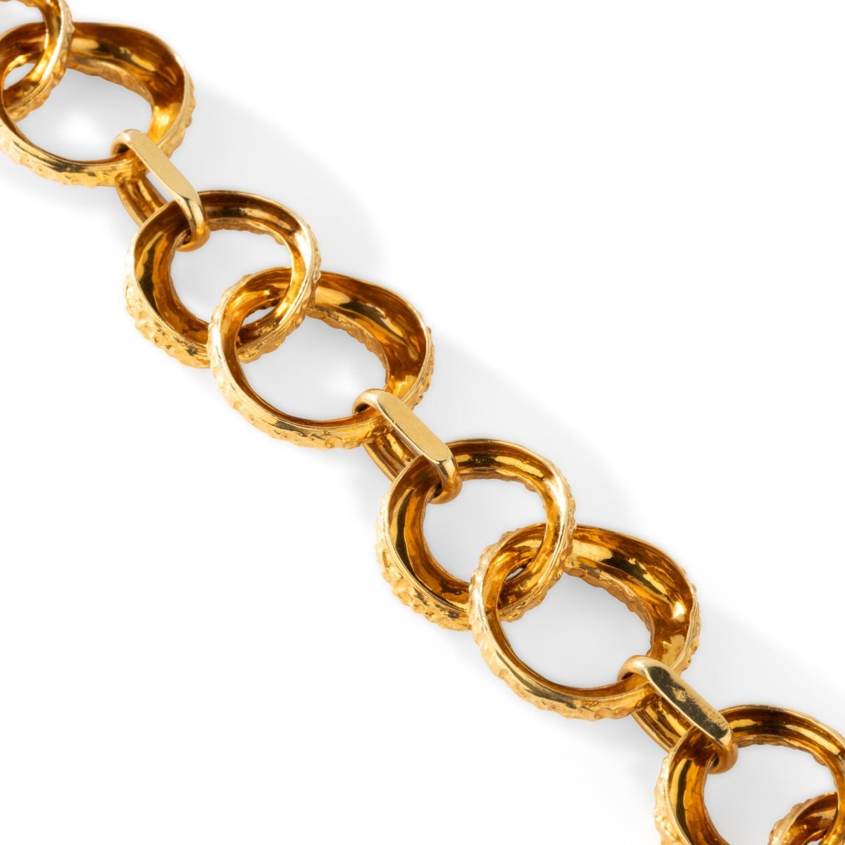Bracelet signé GERARD, souple à maillons en or jaune - Castafiore
