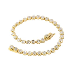 Bracelet tennis vintage en or jaune et diamants en serti clos - Castafiore