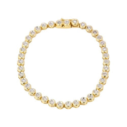 Bracelet tennis vintage en or jaune et diamants en serti clos - Castafiore