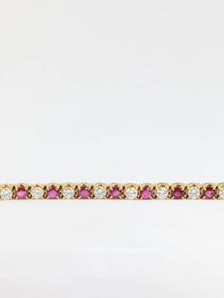 Bracelet tennis vintage en or, rubis et diamants - Castafiore