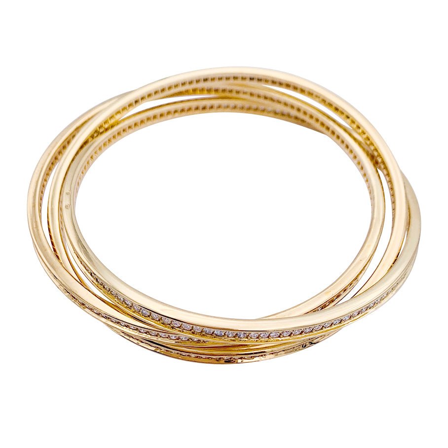 Bracelet triple joncs or jaune, diamants. - Castafiore