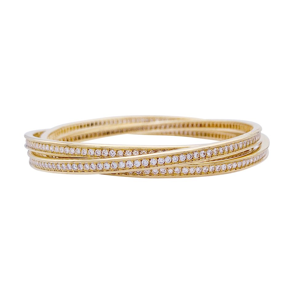 Bracelet triple joncs or jaune, diamants. - Castafiore