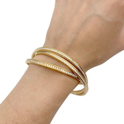 Bracelet triple joncs or jaune, diamants. - Castafiore