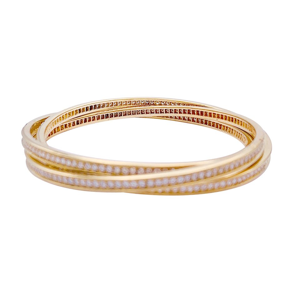 Bracelet triple joncs or jaune, diamants. - Castafiore