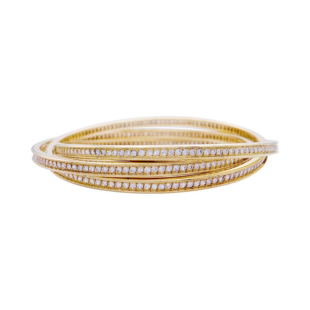 Bracelet triple joncs or jaune, diamants. - Castafiore