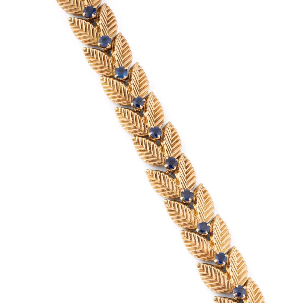 Bracelet VAN CLEEF & ARPELS feuilles en or jaune et saphirs - Castafiore