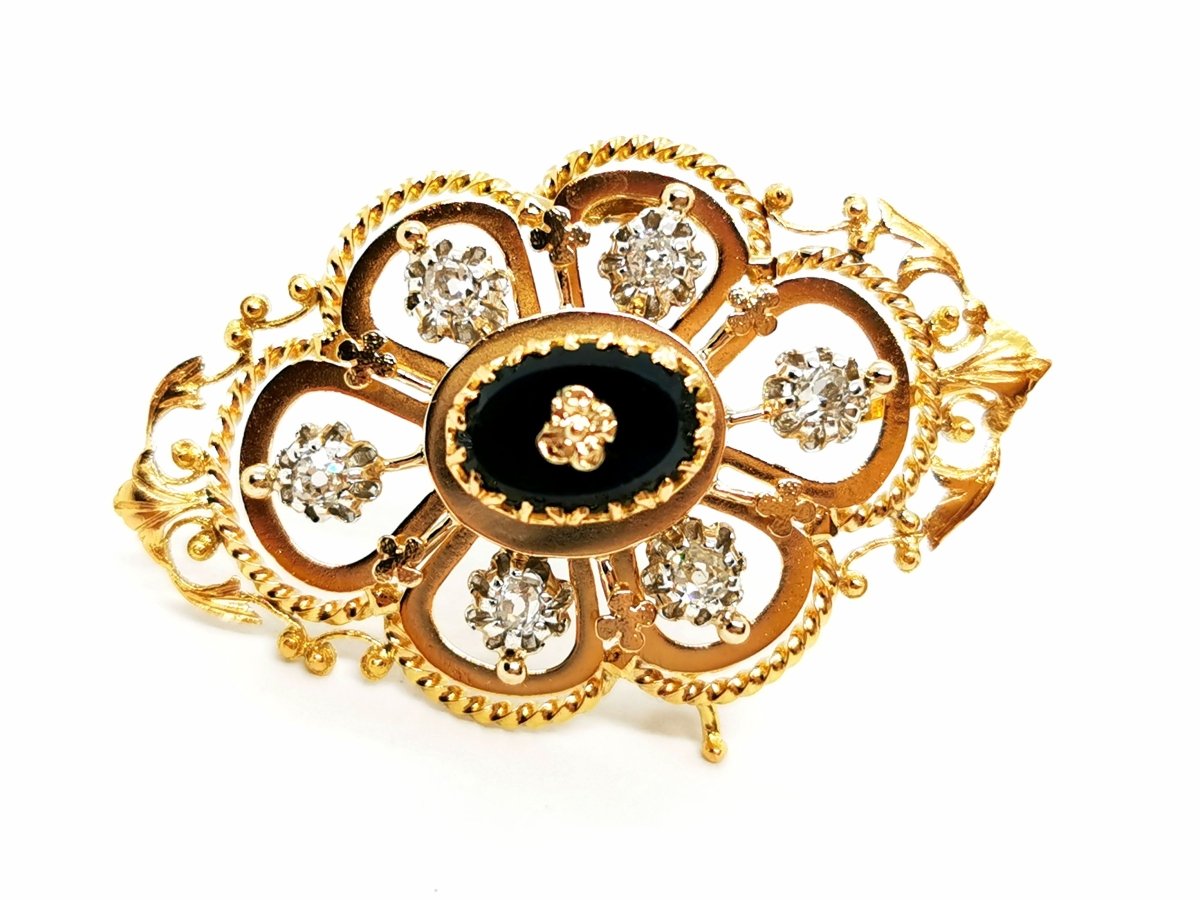 Broche Art déco en or jaune, platine, diamants et onyx - Castafiore