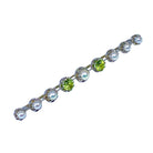 Broche barette en or blanc et platine en perle et peridot - Castafiore