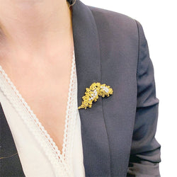 Broche BOUCHERON en or jaune, platine et diamants. - Castafiore