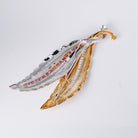 Broche double feuille en 2 ors, rubis et diamants - Castafiore