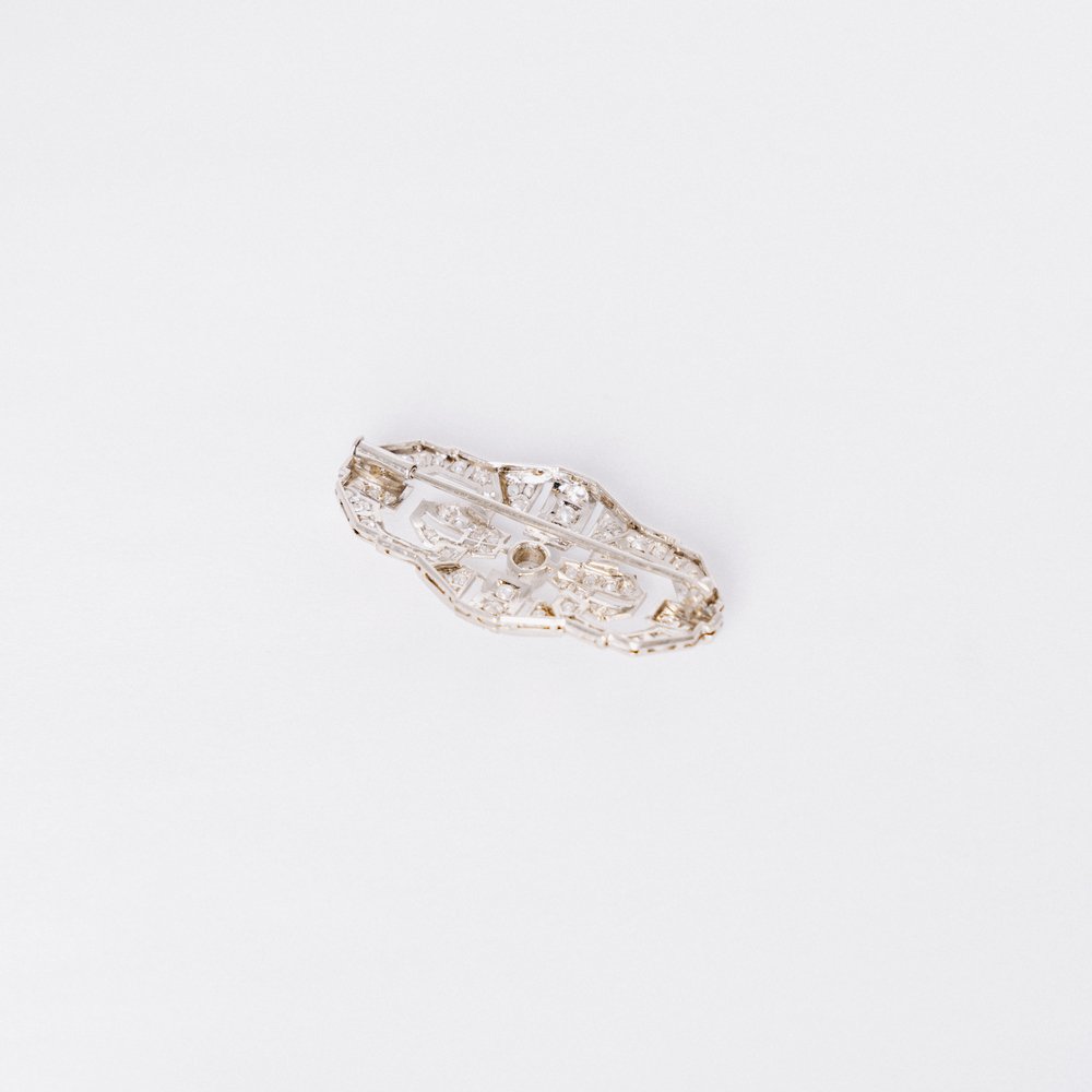 Broche en or gris et diamants - Castafiore